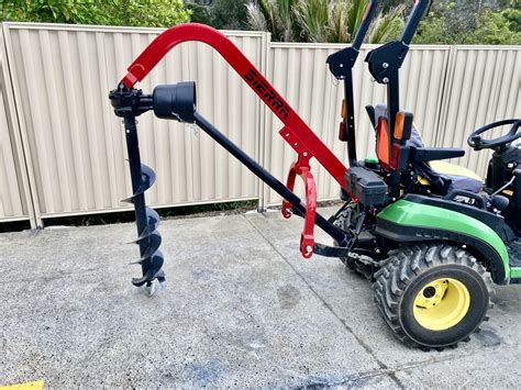 mini digger post hole borer for sale|small tractor post hole digger.